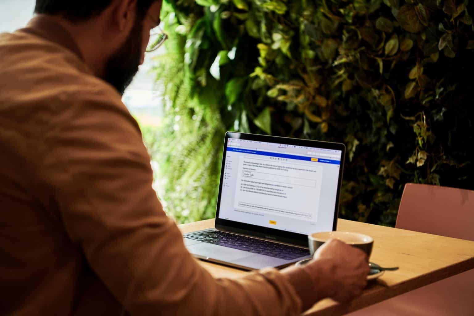 Man looking at online document