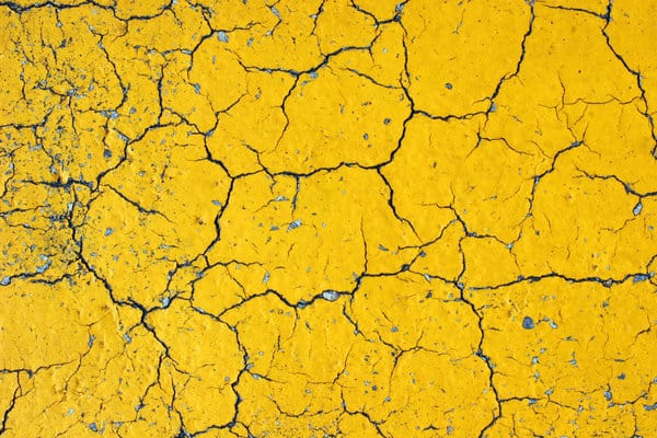 Yellow Asphalt with Cracks